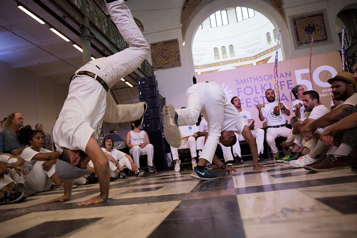 Capoeira roda in the Arts and Industries Building at the 2017 Folklife Festival. Photo by Daniel Martinez, Ralph Rinzler Folklife Archives