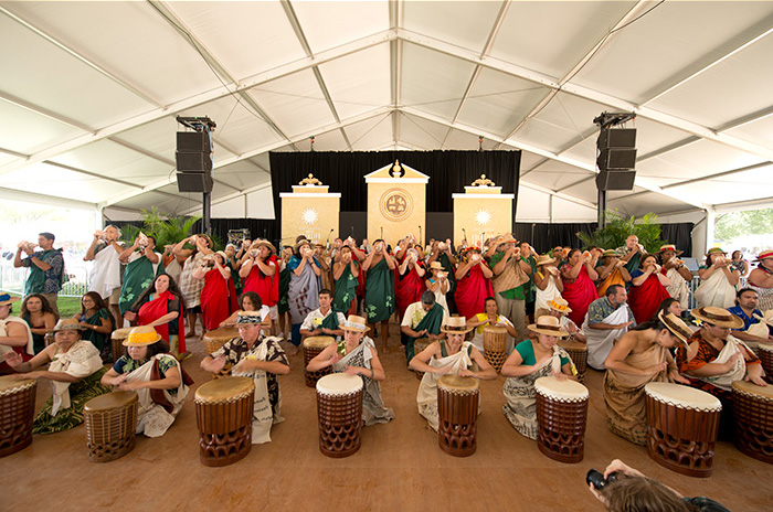 Dancers and musicians in hula group UNUKUPUKUPU perform in the Opening Ceremony of the 2012 Smithsonian Folklife Festival. Photo by Walter Larrimore, Ralph Rinzler Folklife Archives