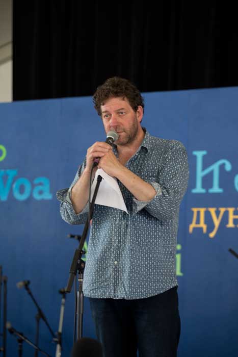Welsh poet and singer Twm Morys at the <i>Voices of the World</i> stage, 2013 Folklife Festival. Photo by Maggie Pelta-Pauls, Ralph Rinzler Folklife Archives