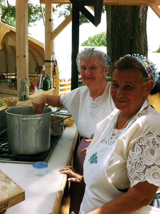 Ilona Bolvári and Éva Bagó preparing <em>krumpli gombóc</em>. Photo by Lili A. Kocsis