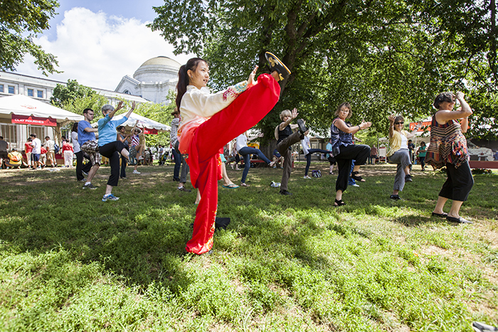 Tian Mengyi leads a tai chi group in People's Park.