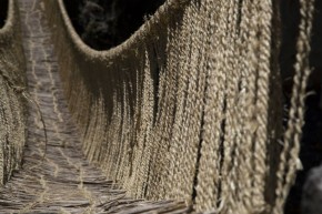 Every June, the four communities surrounding the Q'eswachaka bridge replace the structure with fresh handmade rope to ensure its longevity. Photo by Cristina Díaz-Carrera, Ralph Rinzler Folklife Archives