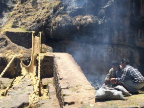 Huinchiri men burn an offering in respect for the Q'eswachaka bridge. Photo by Rafael Varón, Ralph Rinzler Folklife Archives