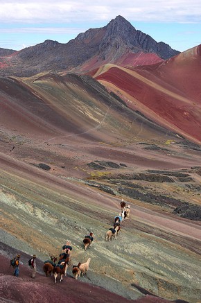 Traversing Ausangate, a mountain peak in the Andes with particular significance in Quechua mythology. Photo by Roger Valencia