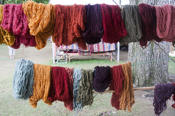 The weavers from the Centro de Textiles Tradicionales del Cusco use natural plant dyes to color their hand spun wool. Photo by Kadi Levo, Ralph Rinzler Folklife Archives