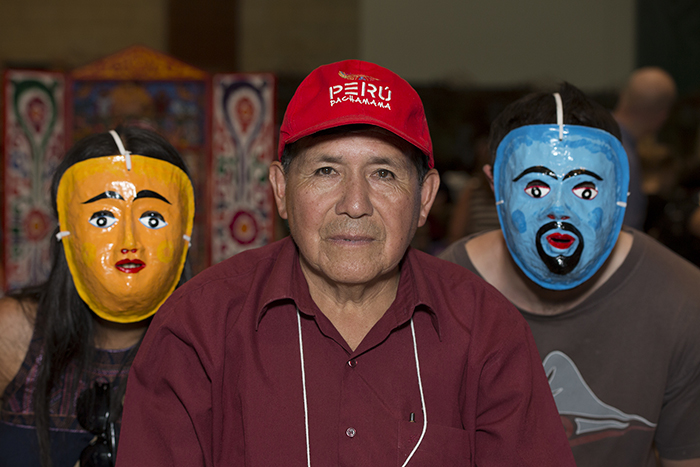 Germán Nilo Prado gave a talk about his masks in the Festival Marketplace, where visitors can also purchase masks to take home! Photo by Pruitt Allen, Ralph Rinzler Folklife Archives