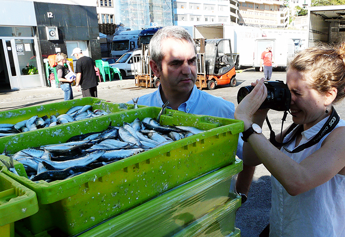 Shooting sardines at the harbor in Ondarroa, Bizkaia, with Asier Madarieta Juaristi, Managing Director of BizkaiKOA. Photo by Mary Linn, Ralph Rinzler Folklife Archives