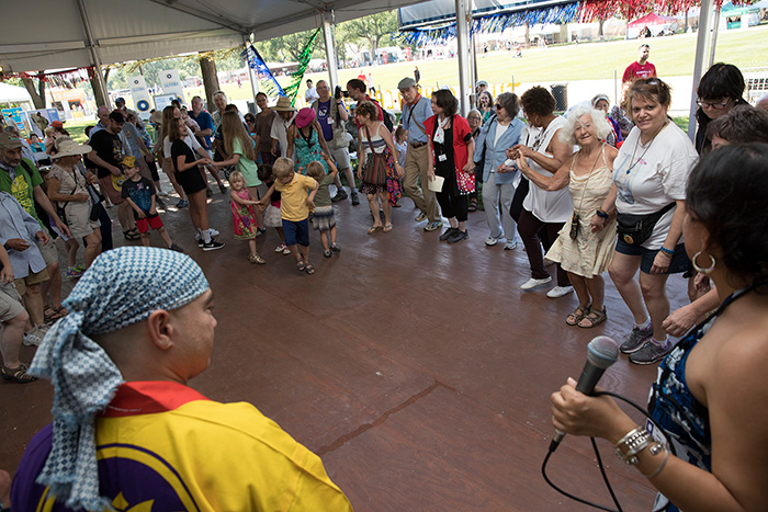 FandangObon got the audience circling around the Sounds of California Stage & Plaza with a mix of Japanese and Mexican dance traditions. Want to join in? You have no choice! Just dance! Photo by Francisco Guerra, Ralph Rinzler Folklife Archives