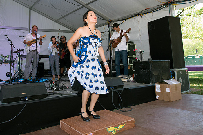 Martha Gonzalez is doing double-duty during the Folklife Festival, playing with the band Quetzal and with the FandangObon group. Today she danced on the tarima platform with her son jarocho group. You can find them each day at the Sounds of California Stage & Plaza. Photo by Walter Larrimore, Ralph Rinzler Folklife Archives