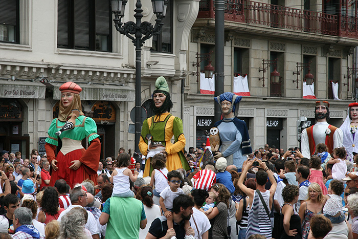 Giants and big heads parade through Bilbao, Bizkaia, during the 2015 Aste Nagusia festival. Photo by Cristina Díaz-Carrera, Ralph Rinzler Folklife Archives