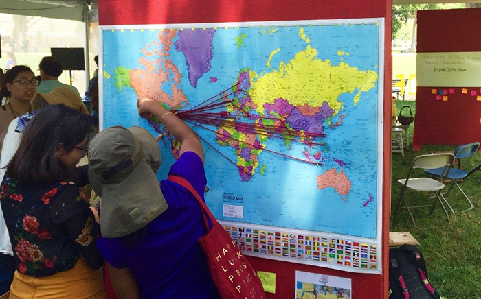 Visitors map their families’ journeys to the United States. Photo courtesy of Raquel Escobar and Priscila Hernandez