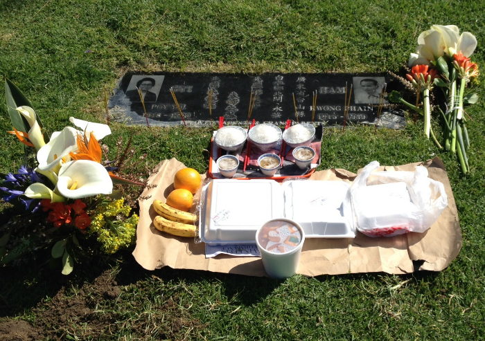 A food offering and picnic at Rose Hills Memorial Park in Whittier, California.
