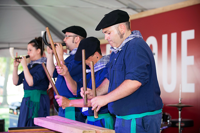Members of the group Klaperttaŕak led a <em>txalaparta</em> workshop in the morning, showing off the Basque instrument made from wooden cider making parts, similar to a xylophone. Photo by Walter Larrimore, Ralph Rinzler Folklife Archives